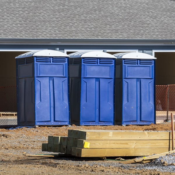 what is the cost difference between standard and deluxe portable toilet rentals in Wilson OK